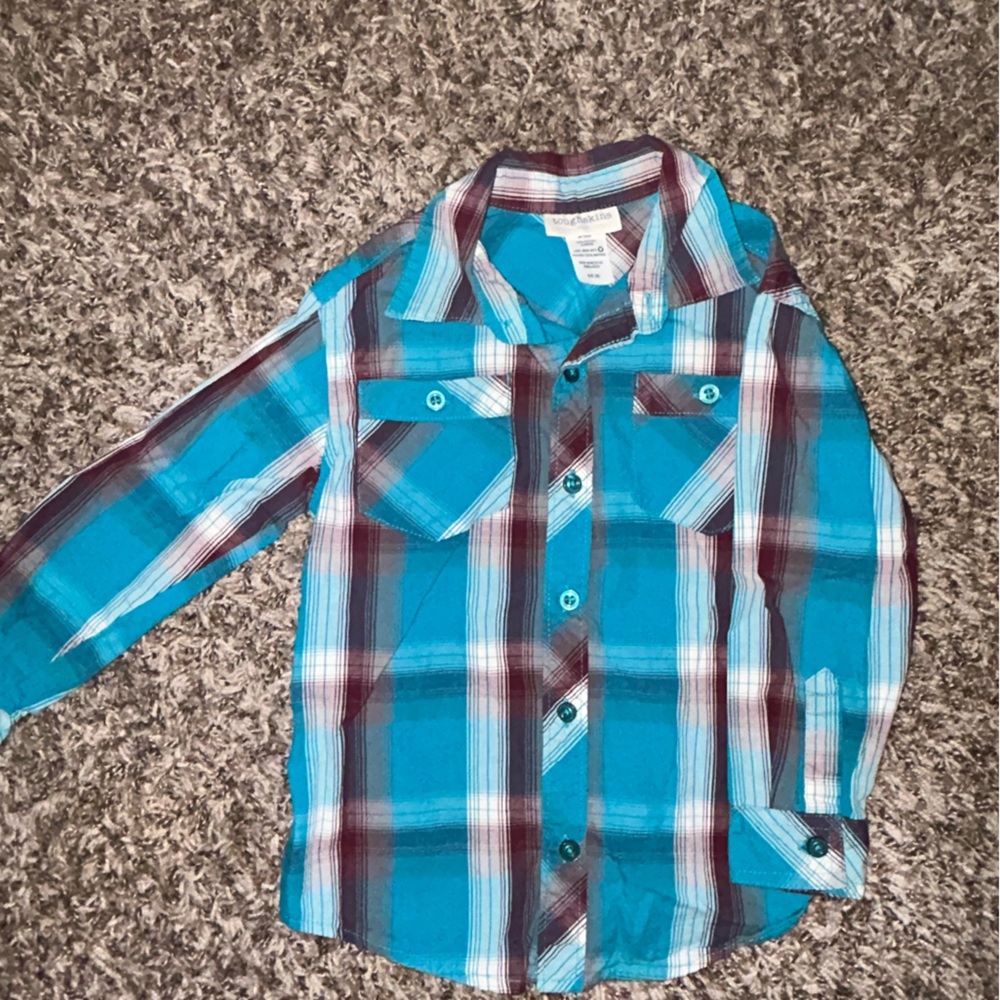 Blue collared button up shirt. Boys size 4.